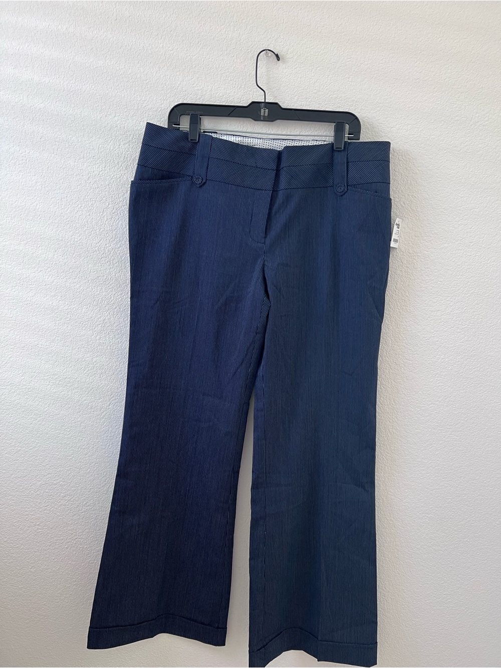 Blue slacks pants with cuff striped 43 inches long in 19 inches across.